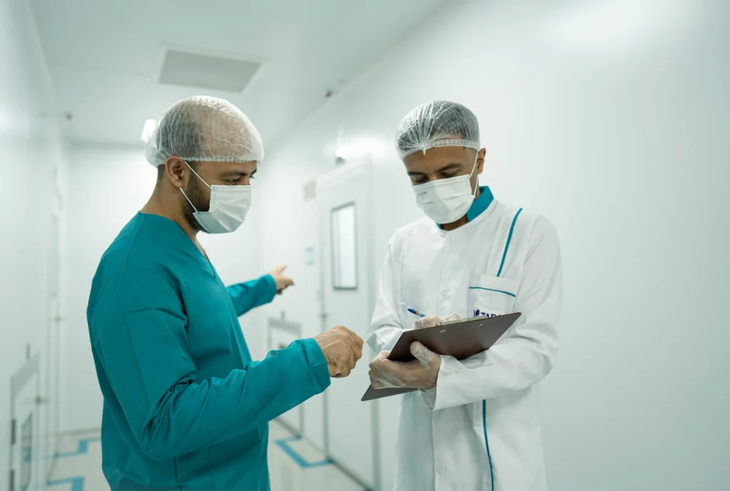 Medical team reviewing surgical notes that a surgical error attorney may later use in a malpractice case.
