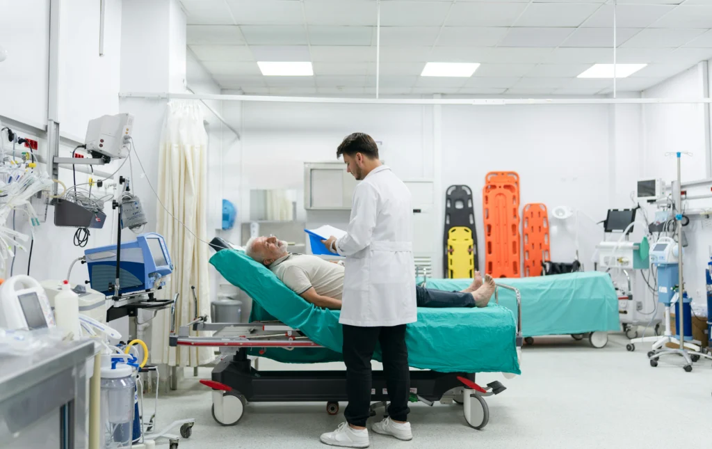 Elderly patient in hospital consulting lawyers for negligence in hospitals