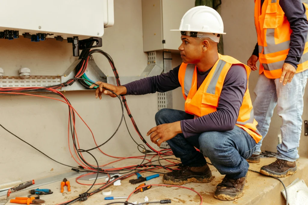 man fixing wiring