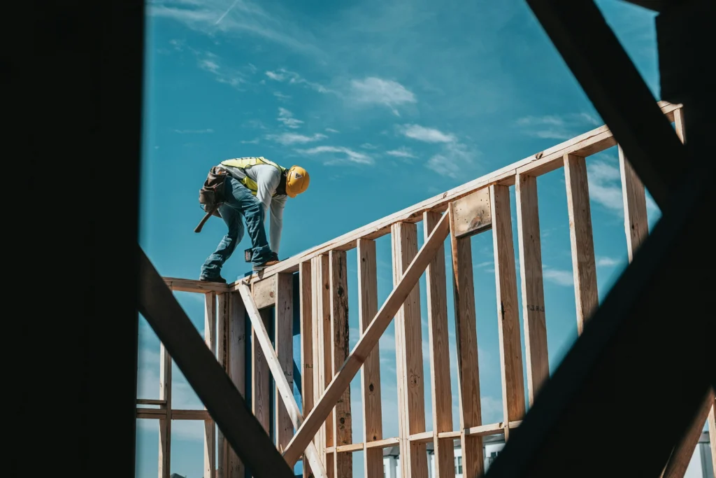 construction worker on scaffolding highlighting dangerous job sites