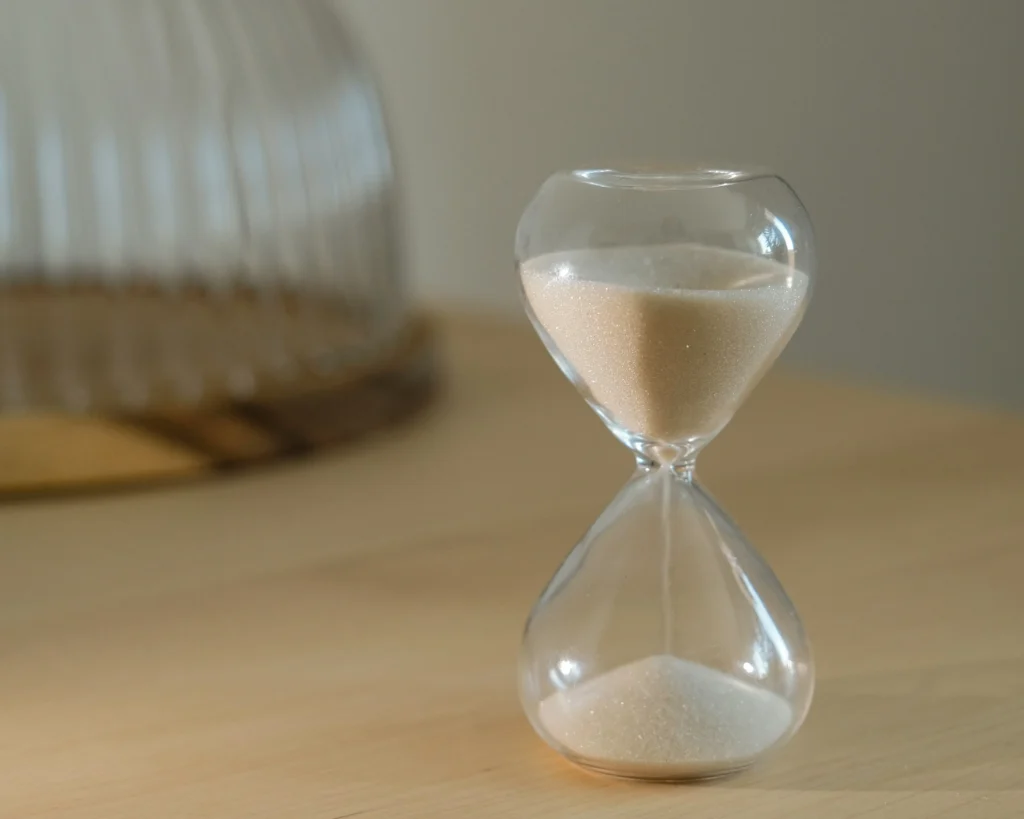 how long does a medical malpractice case take portrayed with an hourglass