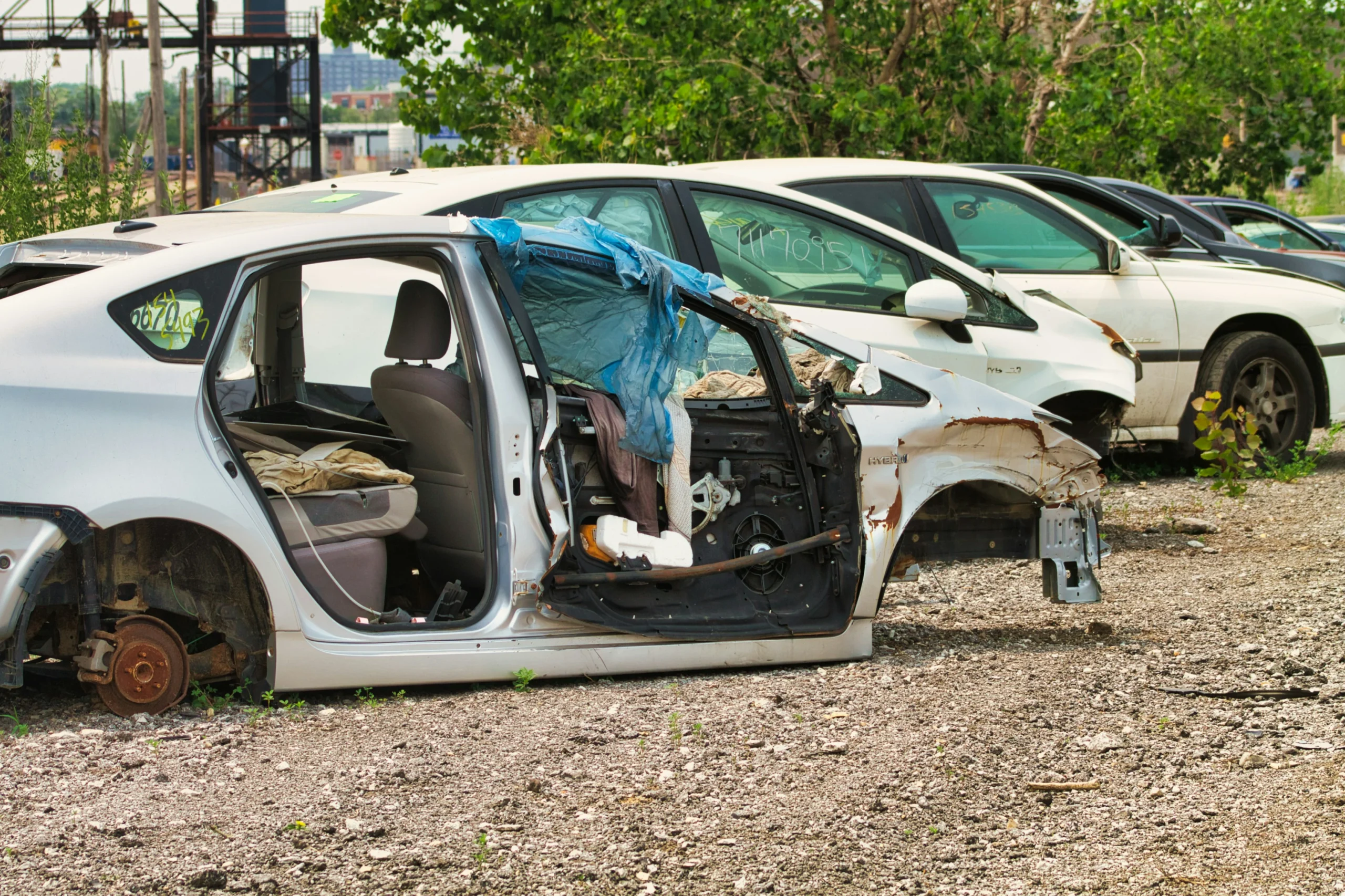 Wrecked vehicle in junkyard after major crash related to car accident lawsuits in Chicago